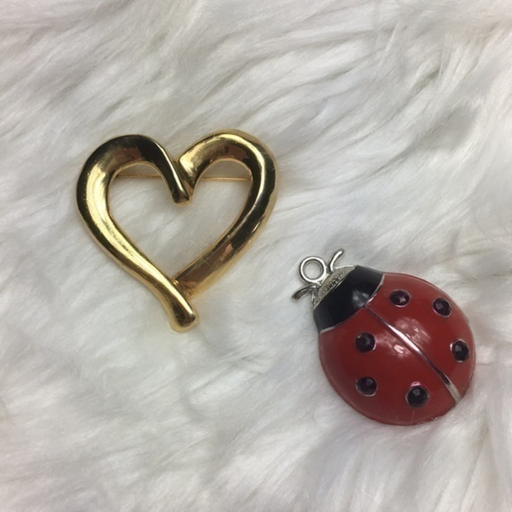Stylized heart brooch, NWOT, 2”by 2”.